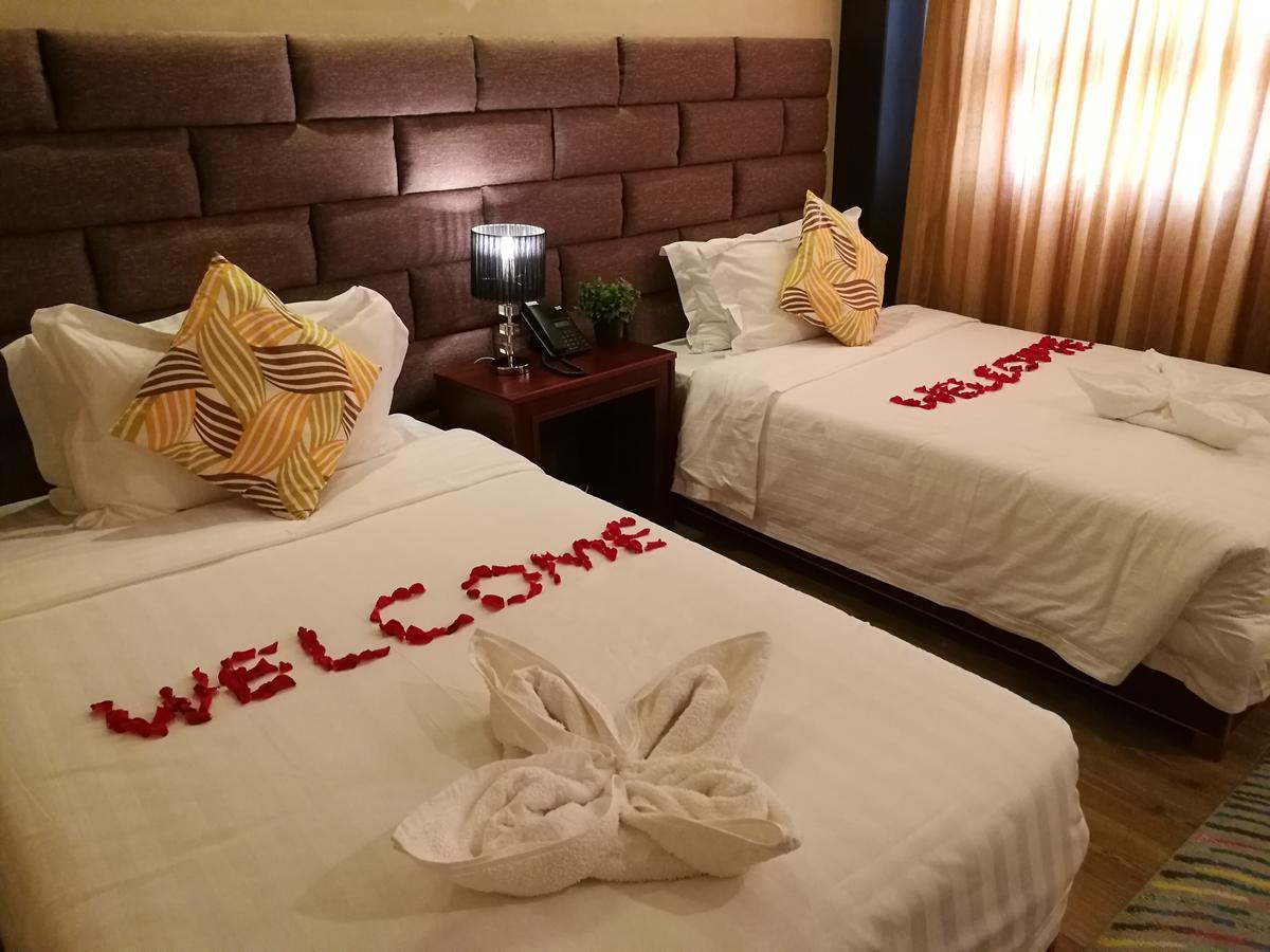 Great Wall Hotel Дар-ес-Салам Номер фото