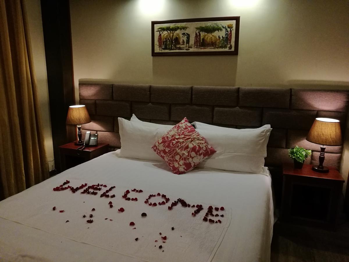 Great Wall Hotel Дар-ес-Салам Номер фото